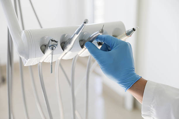 Professional Tooth Extraction technician working in Vero Beach, FL